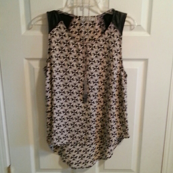 Sleeveless multi colored hi low top