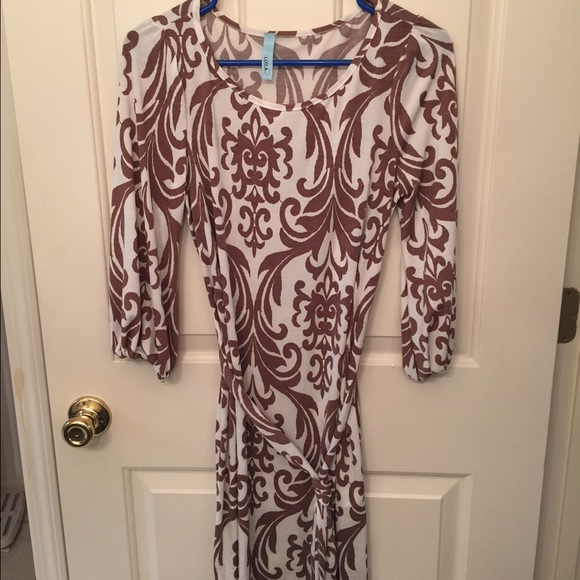 Boutique dress with belt. New without tags. Small