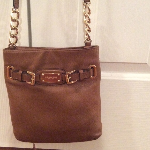 SOLD. Michael Kors cross-body purse