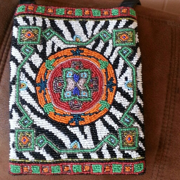 Beautiful cross body bag.      Lower price 24 hrs)