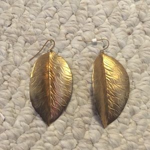 Gold feather shaped earrings
