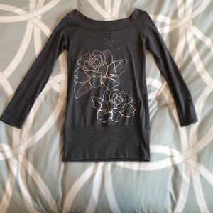 Grey long sleeve boat neck shirt w/ flower design