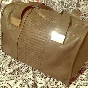 Grey leather barrel bag