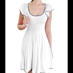 White dress with checkered trim