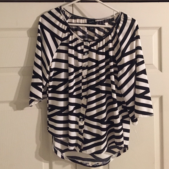 Black and white striped top.