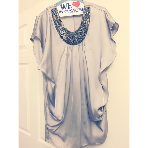 Silk top with beaded neckline