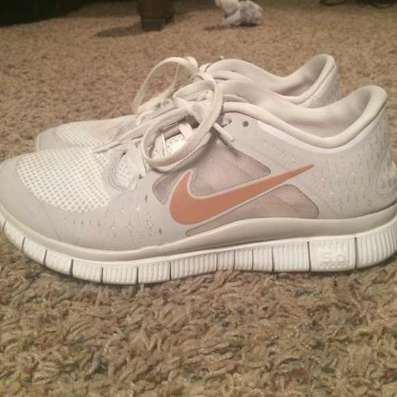 White Nike free runs.