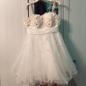 Short white dress with flower detailing
