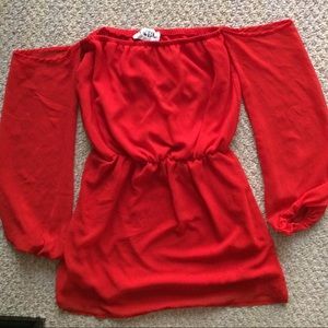 Burnt orange/red dress.