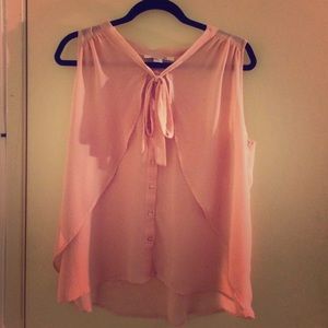 pink sleeveless blouse/ top with bow