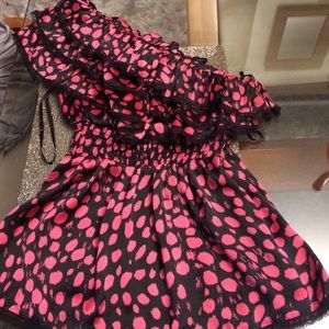 Pretty in pink one shoulder blouse.