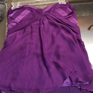 Royal purple flowing blouse. 100% silk.
