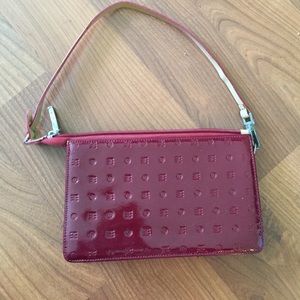 Arcadia cherry clutch