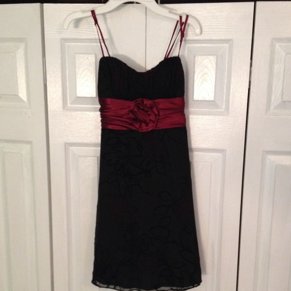 Black dress with red ribbon