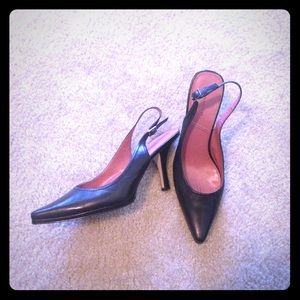 Black leather sling-back pumps