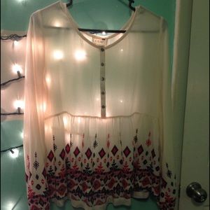 A sheer an glamorous BOHO blouse