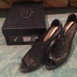 Prada peep-toe cut out black leather pumps