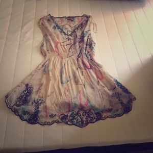 Flowy sleeveless "paint splatter" top