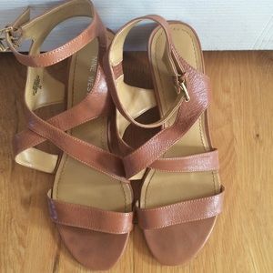 Cute and professional brown Nine West wedges!
