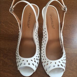 White open toe pumps