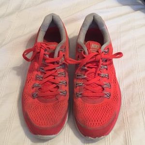 Bright orange Nikes! Gently used