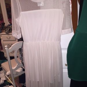 Body con dress with pretty short sleeve overlay