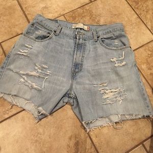 Vintage Levi's 559 distressed jean shorts