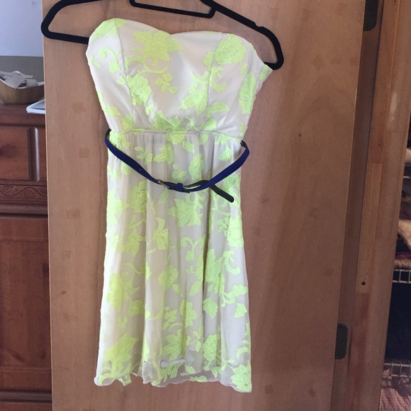 Nude dress with neon green stitched floral print.