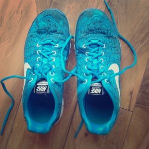 Nike Free.  Blue with a small specs of neon yellow