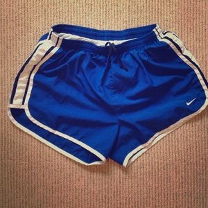 Blue Nike dri-fit running shorts