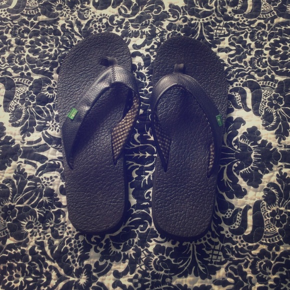 Black Sanuk flip flops