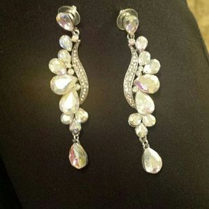 Gold tone ara descent earrings