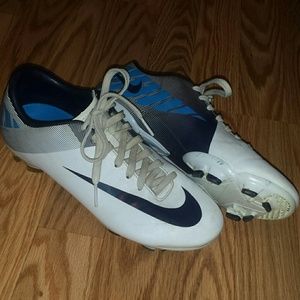 White and blue Nike Mercurial soccer cleats