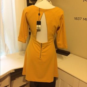 Retro Style Dress. Cut out back. New with tag. Med