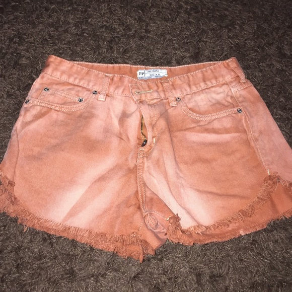 Free People burnt orange denim shorts.