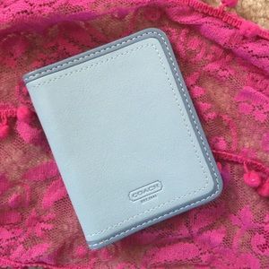 Brand New. Baby blue Coach ID holder.