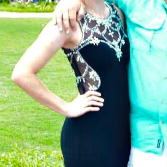 Black Betsy&Adam prom dress with embellishments.