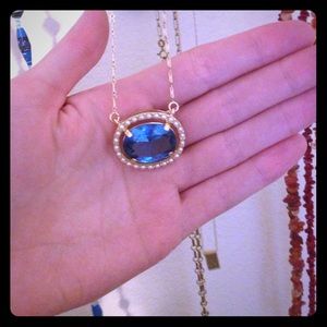 Giant blue topaz gold necklace and milor necklace