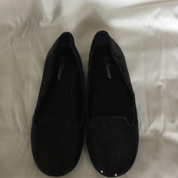 Black sequence loafers