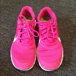 pink nike frees