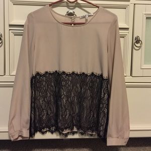Blush colored shirt with black lace