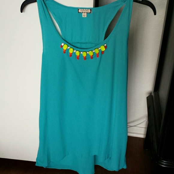 Turquoise colored top with neon jewels