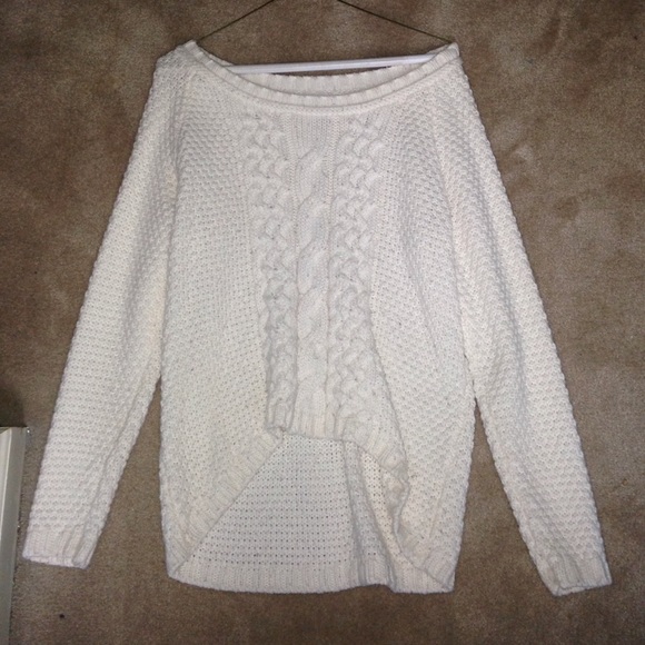 White knit sweater.