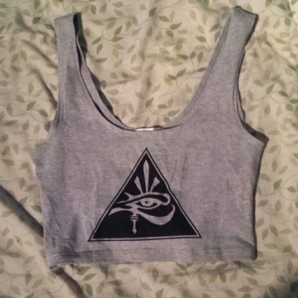 A very cropped top with egyption design