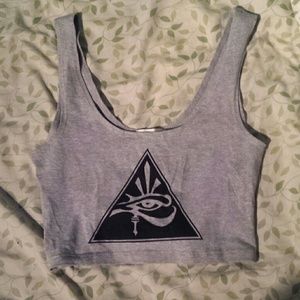 A very cropped top with egyption design