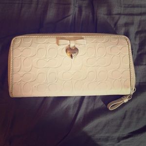 White leather coach wallet