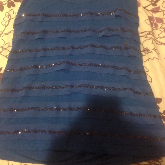 Blue sequenced New York and company shirt.