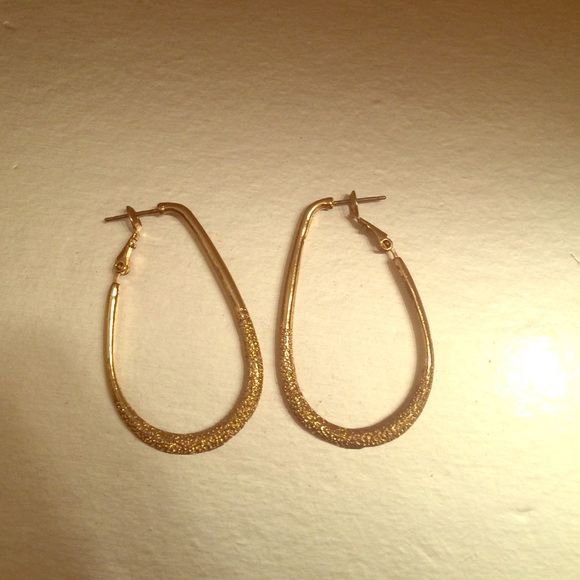 Gold tear shaped hoop earrings