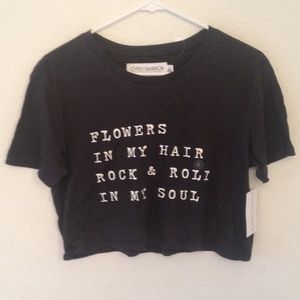 Flowers in my hair rock and roll in my soul