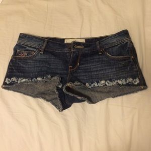 Denim shorts with blue flower detail